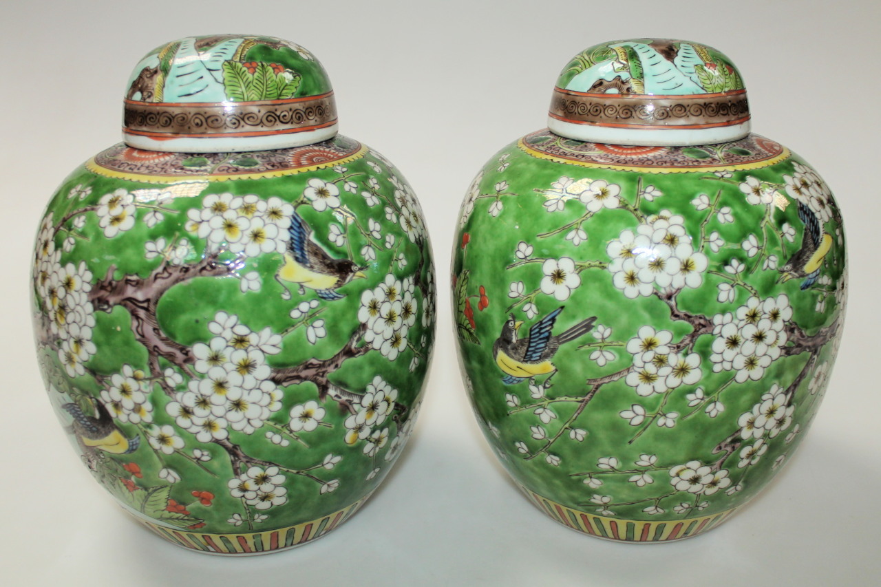 Appraisal: A pair of Chinese earthenware ginger jars and covers each