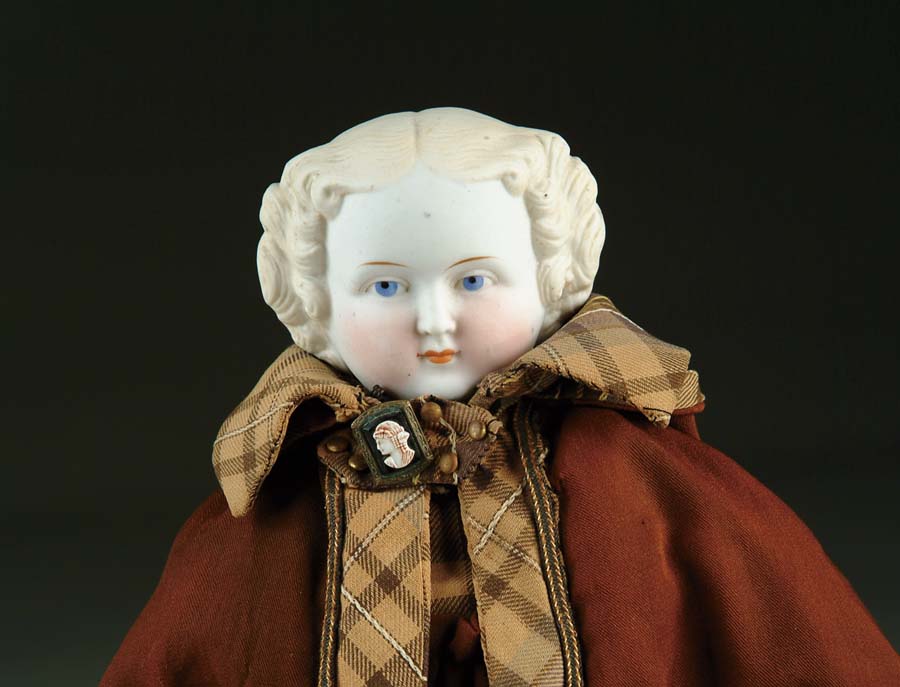 Appraisal: PARIAN DOLL Parian shoulder head with molded and painted features