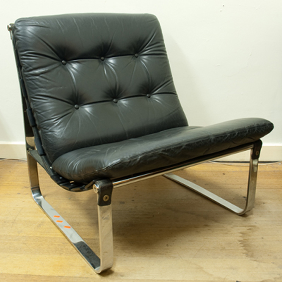 Appraisal: PAIR OF NORWEGIAN BLACK LEATHER AND CHROME CHAIRS