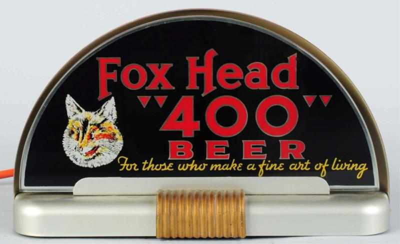 Appraisal: Fox Head Beer Reverse Glass Cab-Style Sign Manufactured by Price