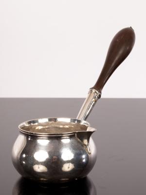 Appraisal: A George II silver brandy warmer Richard Gosling London with