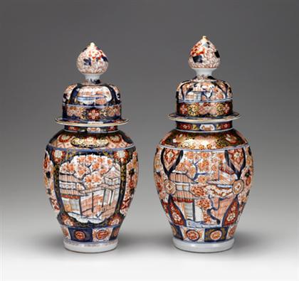 Appraisal: Two similar Imari pattern covered urns th century In the