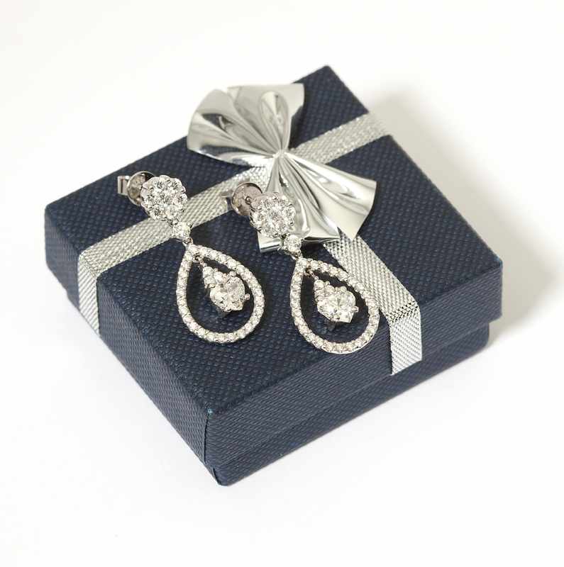 Appraisal: A pair of diamond and white gold pendant earrings K