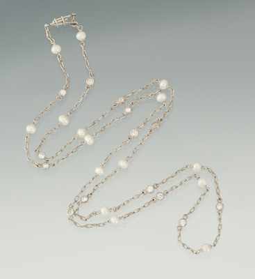 Appraisal: A Platinum Diamond and Pearl Chain Platinum chain set with