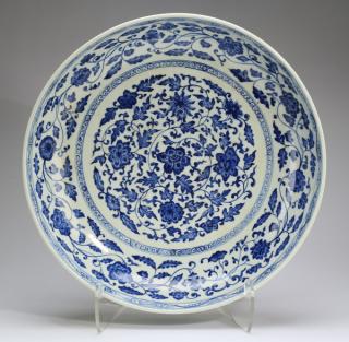 Appraisal: Chinese blue and white lotus charger w Chinese blue and