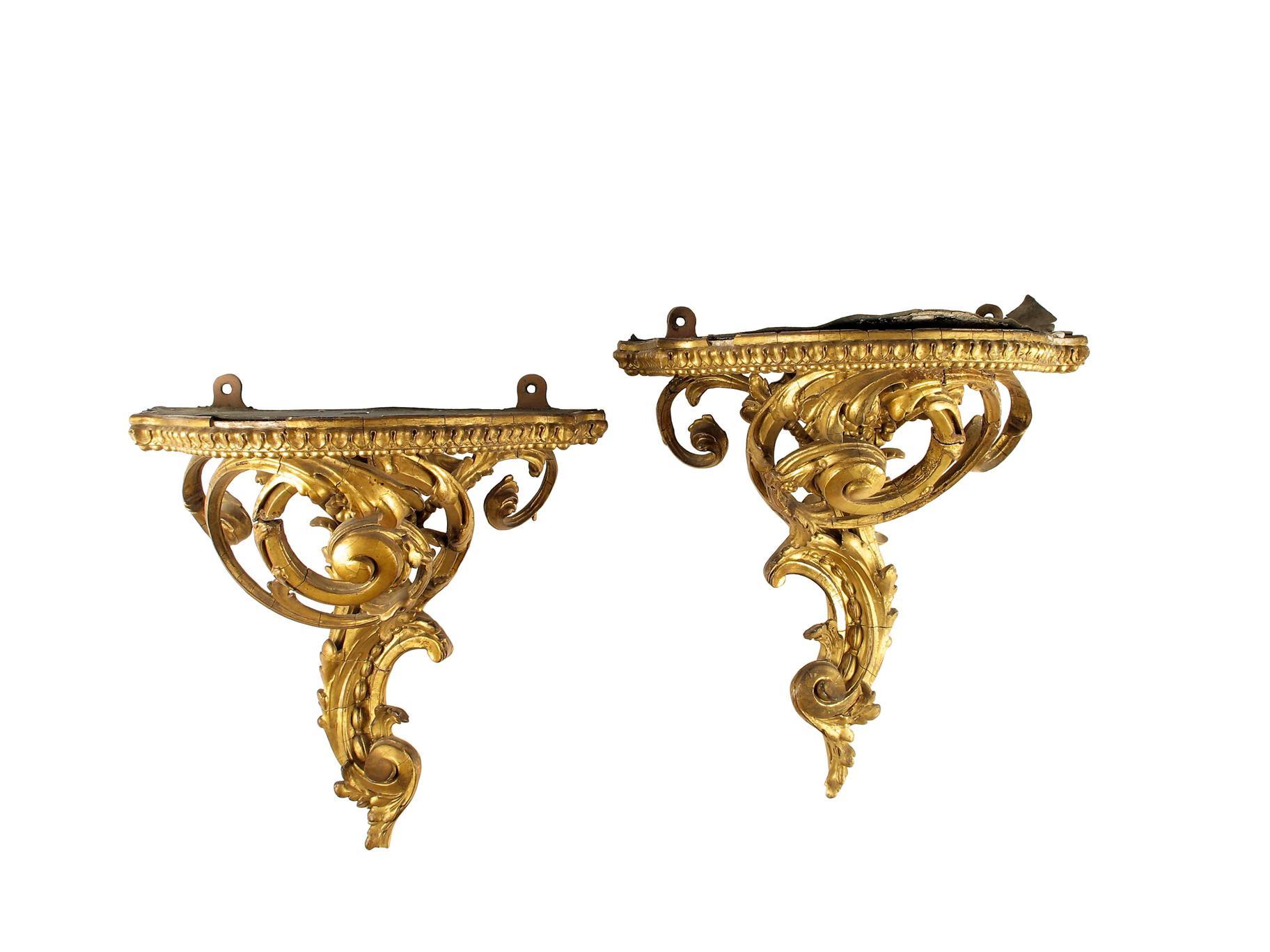 Appraisal: A pair of Victorian giltwood and composition wall brackets