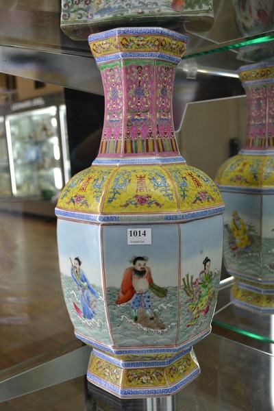 Appraisal: A CHINESE FAMILLE ROSE OCTAGONAL BALUSTER VASE SCHOLAR SCENES TO