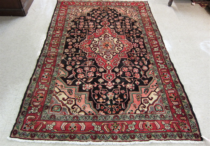 Appraisal: PERSIAN HOSSEINABAD AREA RUG Hamadan tribal villages region northwestern Iran