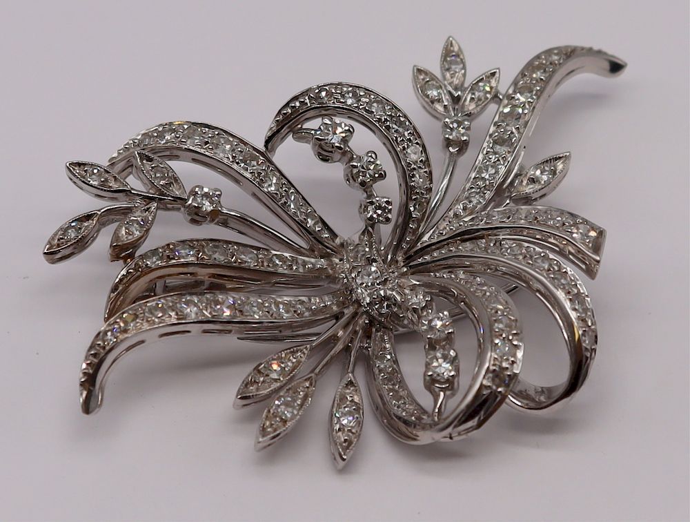 Appraisal: JEWELRY Platinum and Diamond Floral Spray Brooch Vintage platinum and