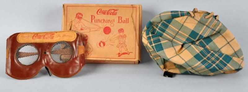 Appraisal: s Coca-Cola Punching Ball Game Description Very rare game complete