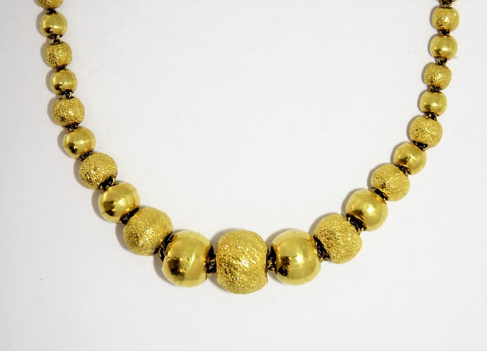 Appraisal: K Gold Indian Stippled Polished Bead Necklace India th Century