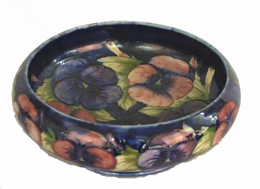 Appraisal: Moorcroft 'Pansy' circular bowl with inverted rim and decorated upon