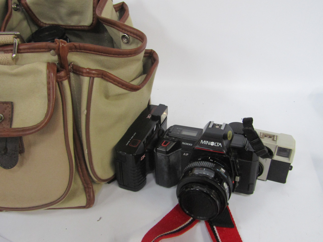 Appraisal: A Minolta mm SLR camera with - lens and -