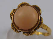 Appraisal: A yellow metal tests carat gold coral ring coral approx