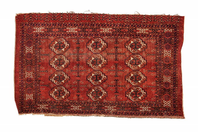 Appraisal: A TURKOMAN KIZIL AYAK RUG decorated three rows of four