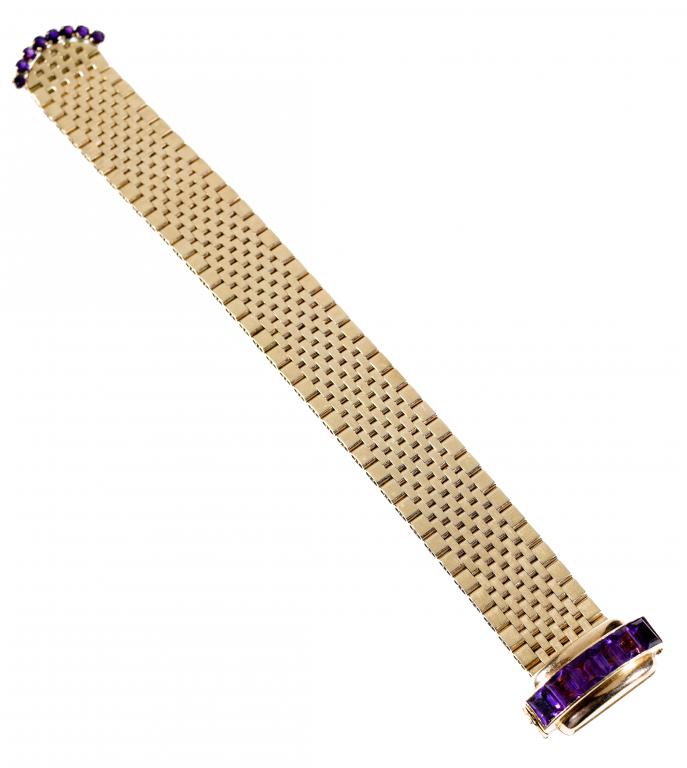 Appraisal: A GOLD BRACELET in the form of a strap with