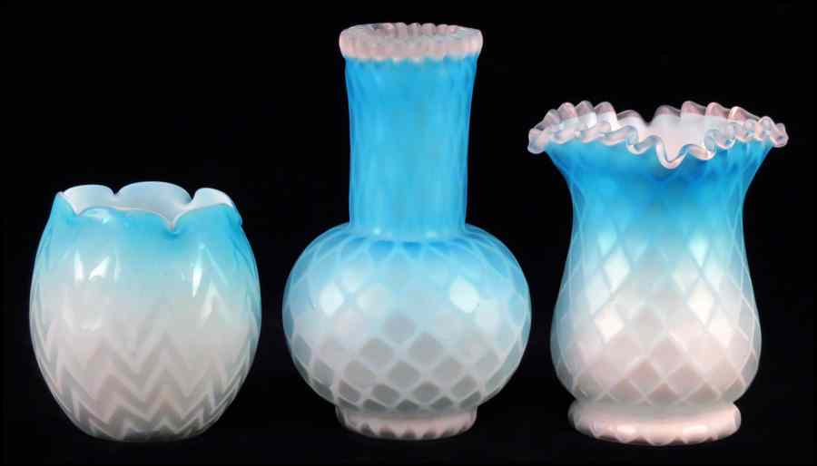 Appraisal: TWO QUILTED SATIN GLASS VASES Both with ruffled glass necks