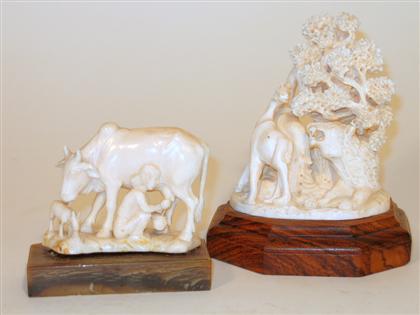 Appraisal: Two Indian elephant ivory models Comprised of an animal grouping