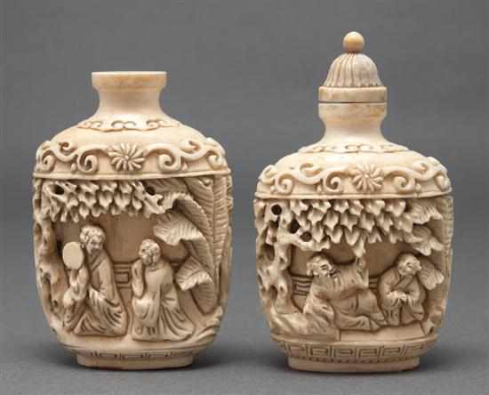 Appraisal: Two Chinese carved ivory snuff bottles each with relief mandarin