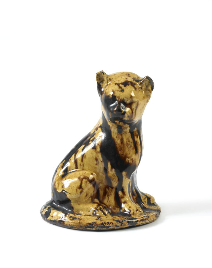 Appraisal: GLAZED YELLOWWARE SEATED CAT PROBABLY ENGLISH EARLY NINETEENTH CENTURY With