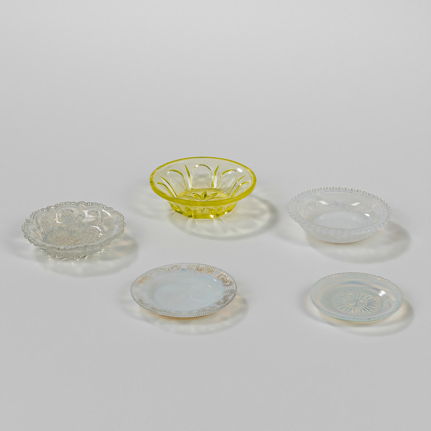 Appraisal: FIVE GLASS BLOWN MOLDED CUP PLATES OR SMALL BOWLS some