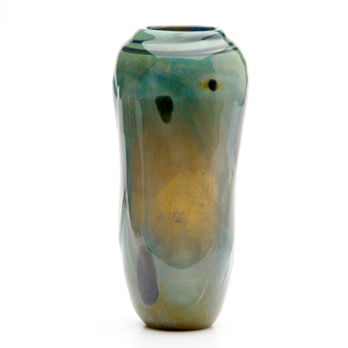 Appraisal: ROLAND JAHN Free-form glass vase in shades of blue green