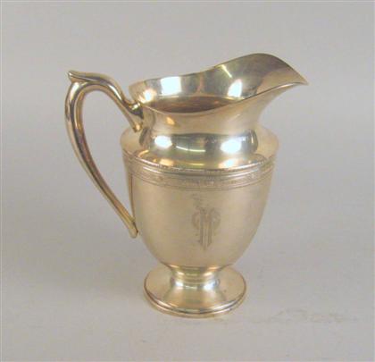 Appraisal: American sterling silver water pitcher julius goodman sons Of helmet