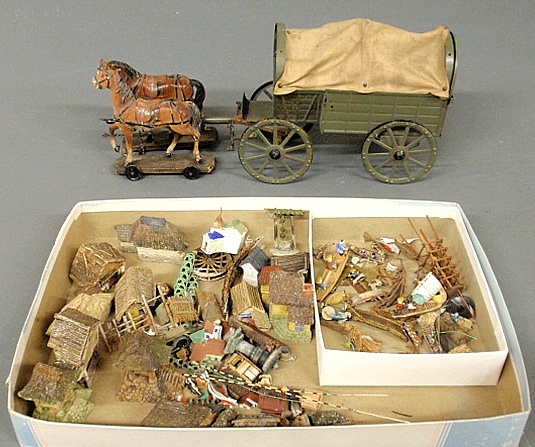 Appraisal: - Tin covered wagon with olive drab paint decoration with