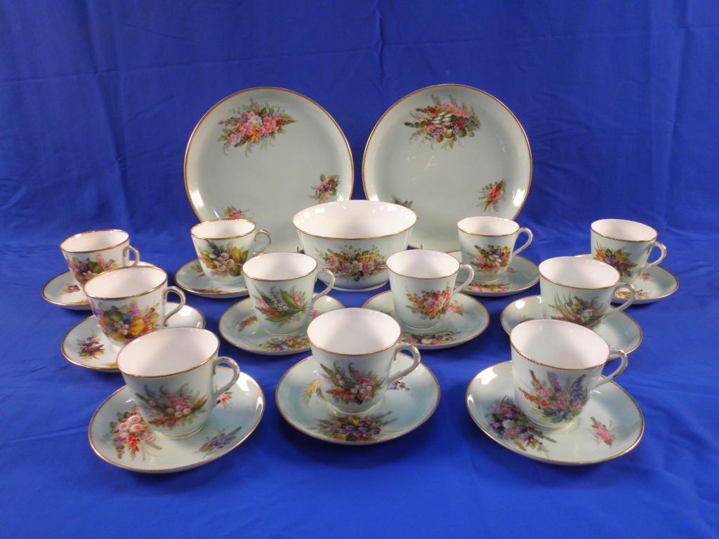 Appraisal: A Royal Worcester composite tea service decorated with sprays of