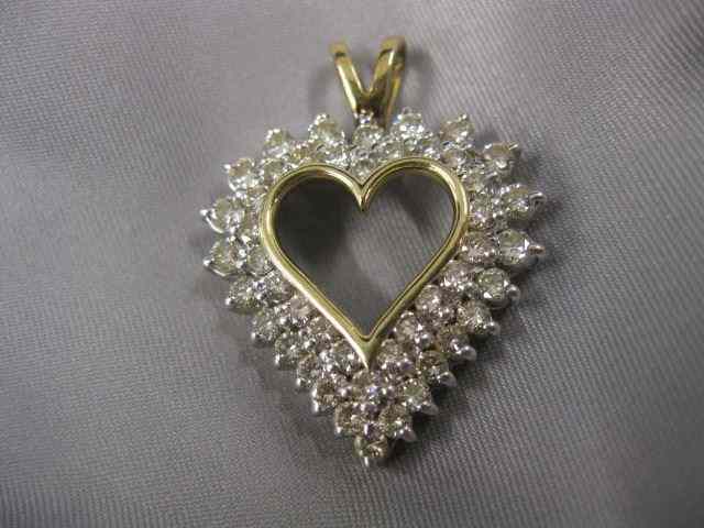 Appraisal: Diamond Heart Pendant round diamonds totaling carats in k yellow