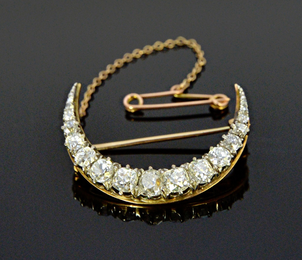 Appraisal: A gold backed and silver fronted diamond set brooch designed