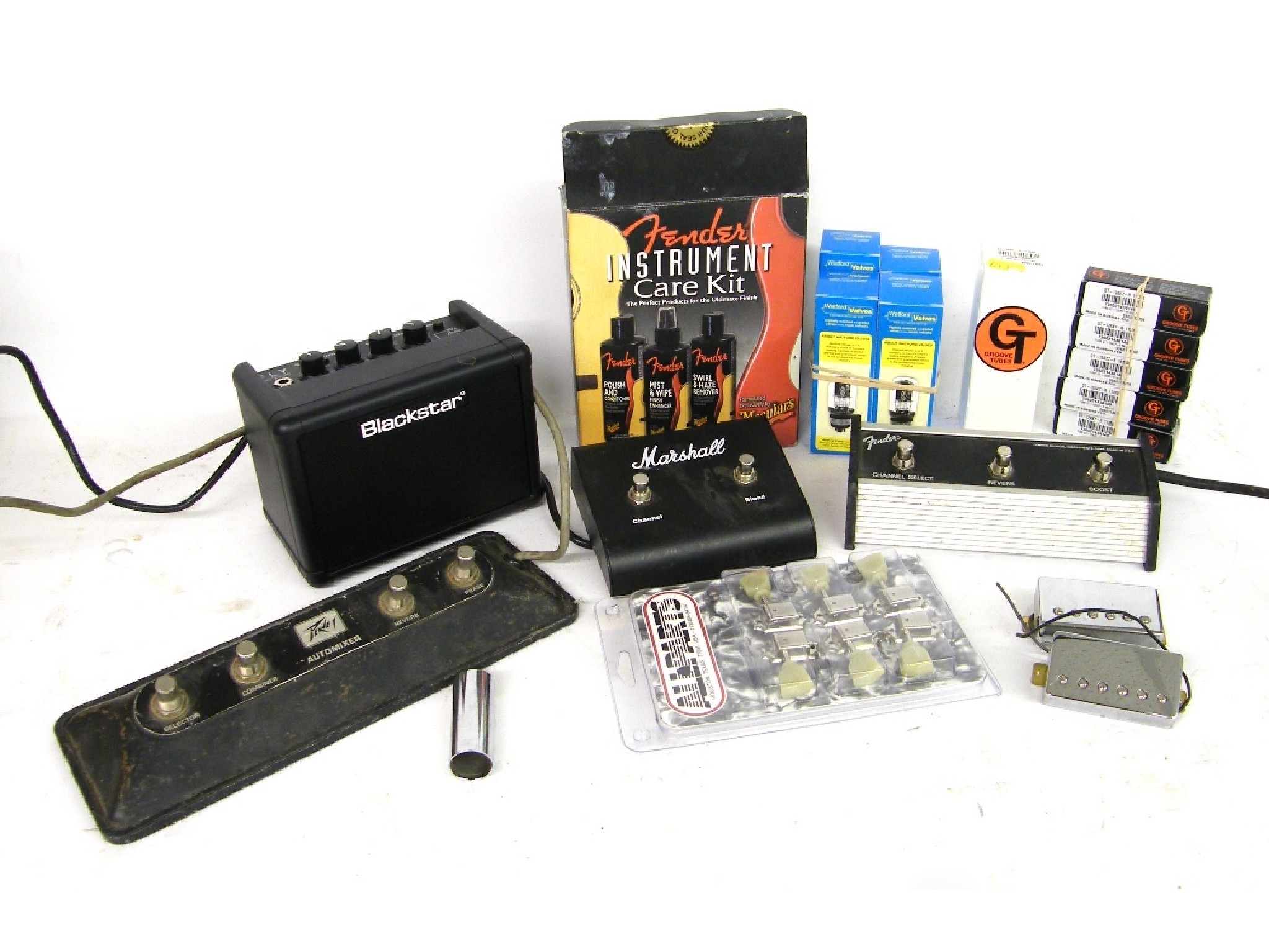 Appraisal: Quantity of guitar accessories to include four new and boxed