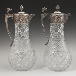 Appraisal: Pair of Silverplated Pressed Glass Claret Jugs c with relief