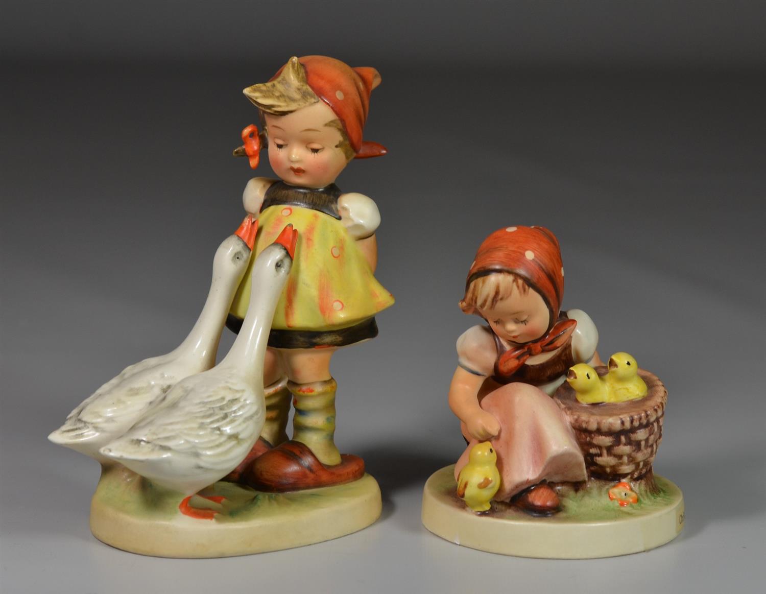 Appraisal: Goebel Hummel Figurines Goose Girl Germany Chick Girl West Germany