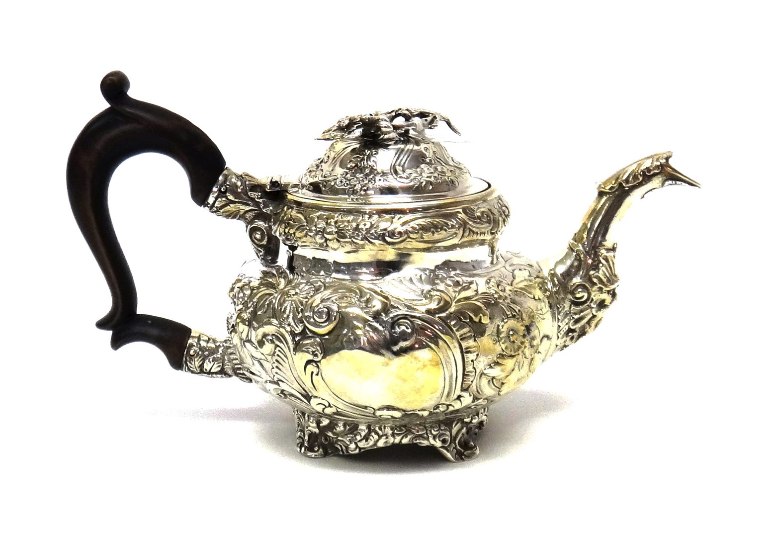 Appraisal: A George III silver small teapot with floral foliate and