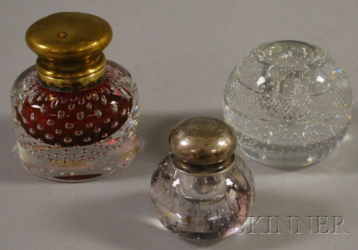 Appraisal: Two Colorless Trapped Bubble Pattern Paperweight-form Glass Inkwells and a