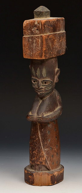 Appraisal: A TH CENTURY YORUBA CARVED WOODEN FEMALE FIGURE perhaps the