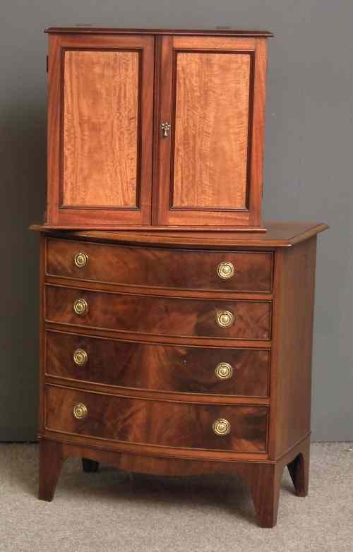 Appraisal: A mahogany bow-front chest of drawers of Georgian design ins