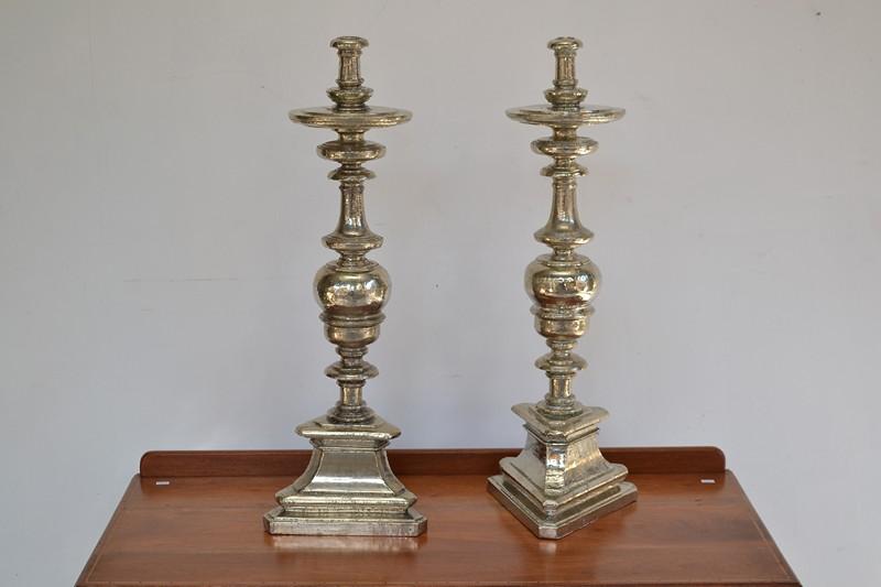 Appraisal: A PAIR OF SILVERED CANDLESTICKS A PAIR OF SILVER CANDLESTICKS