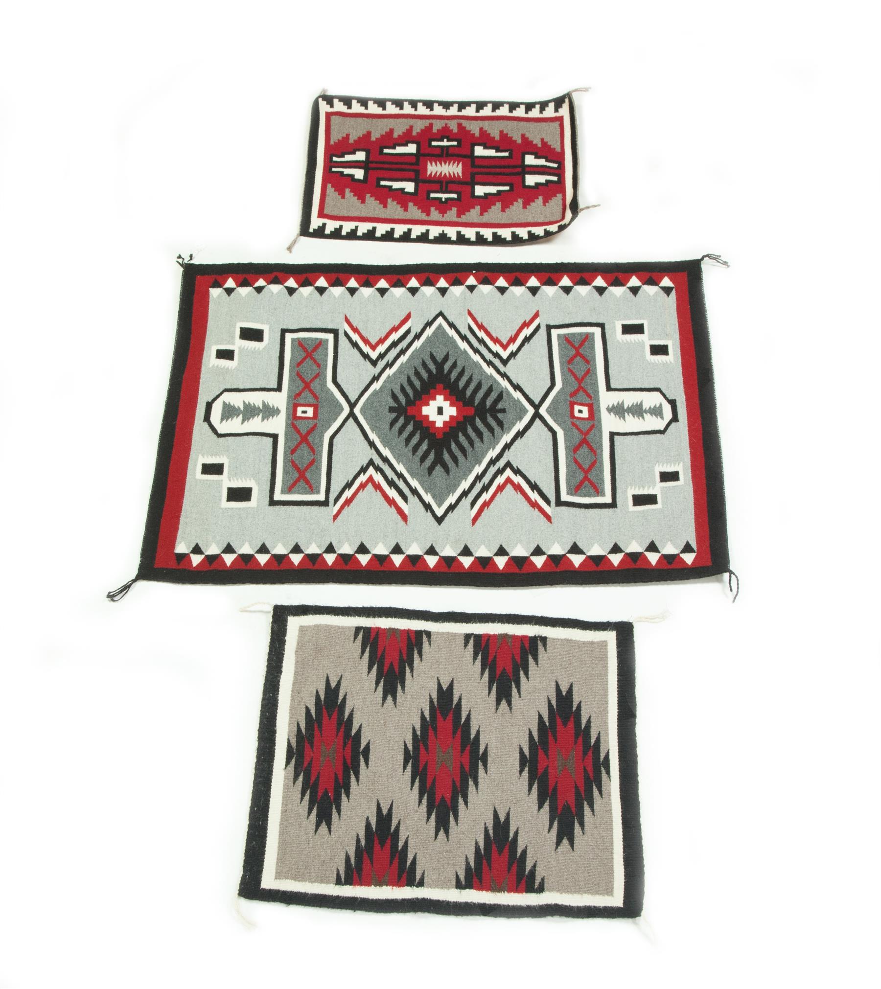 Appraisal: THREE NAVAJO RUGS Southwest Native American th century Hand woven