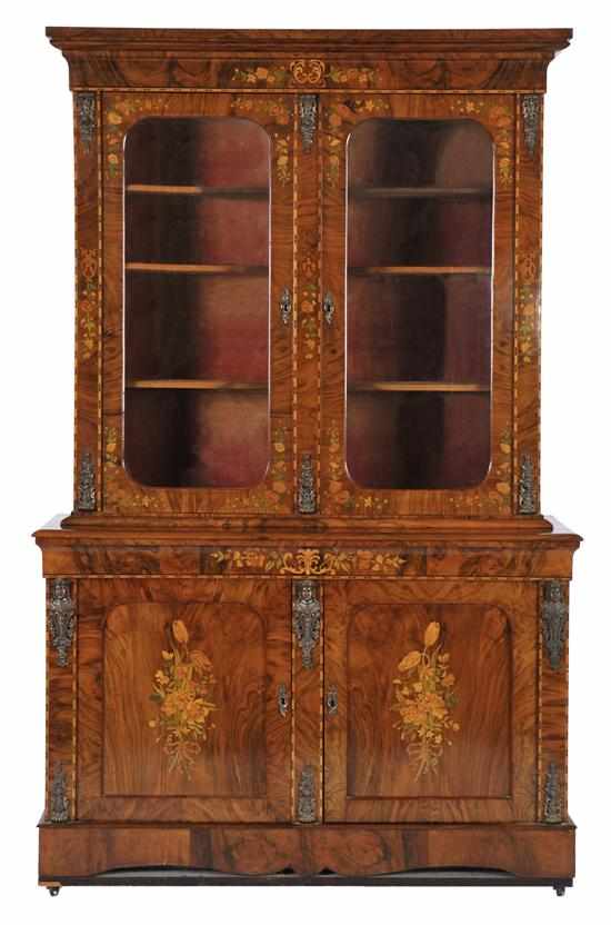 Appraisal: A FINE VICTORIAN BURR WALNUT AND MARQUETRY BOOKCASE The ogee