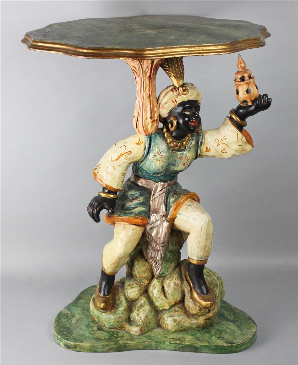 Appraisal: BLACKAMOOR COMPOSITION SIDE TABLE decoratively hand painted serpentine top above