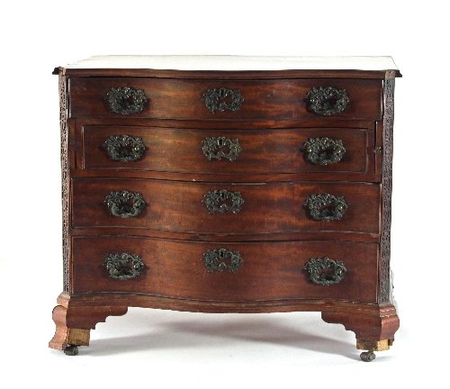 Appraisal: A George III mahogany serpentine dressing chest with four long