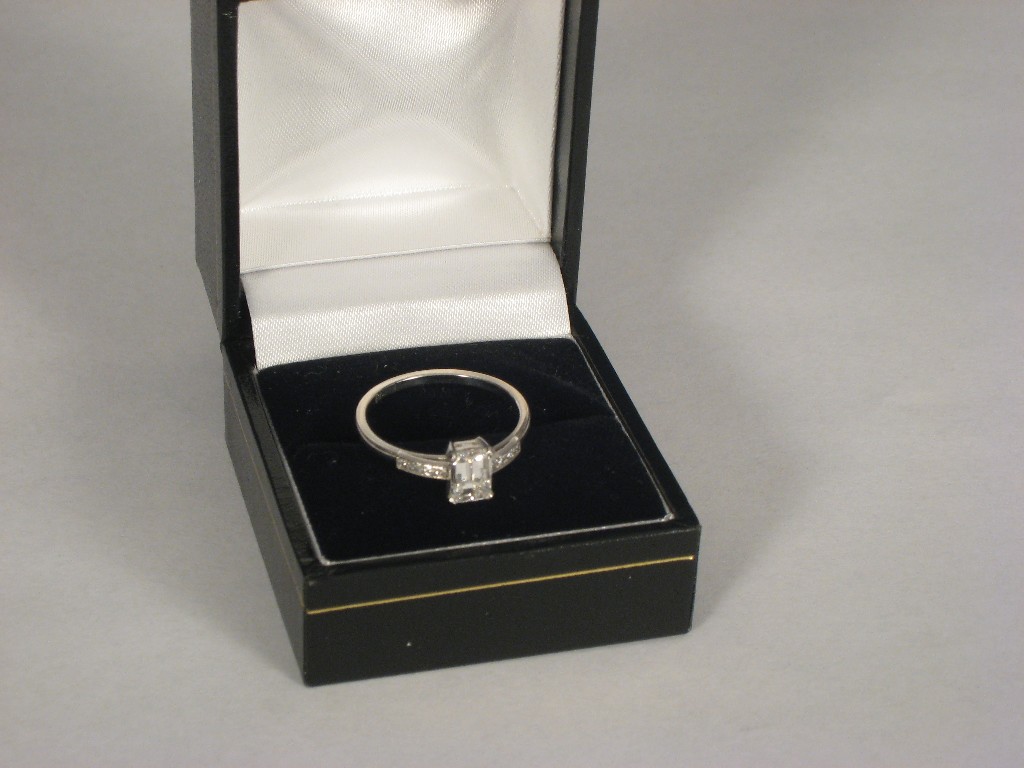 Appraisal: A Contemporary Platinum Ring set emerald cut diamond approx ct