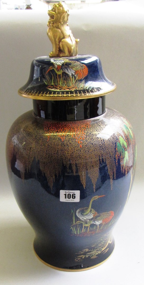 Appraisal: A Carltonware vase and cover th century with gilt dog