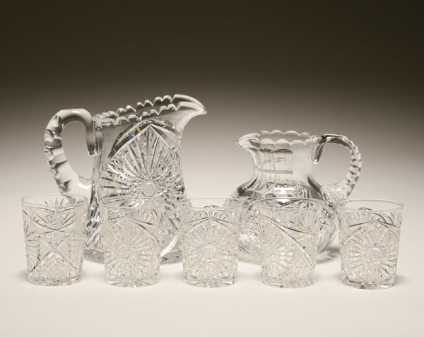 Appraisal: Seven cut glass pitchers and tumblers two brilliant pitchers and