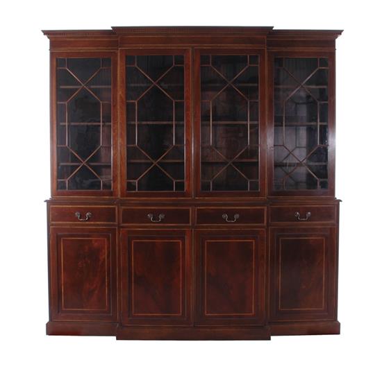 Appraisal: Georgian style inlaid mahogany breakfront bookcase dentil-molded crown glazed panel