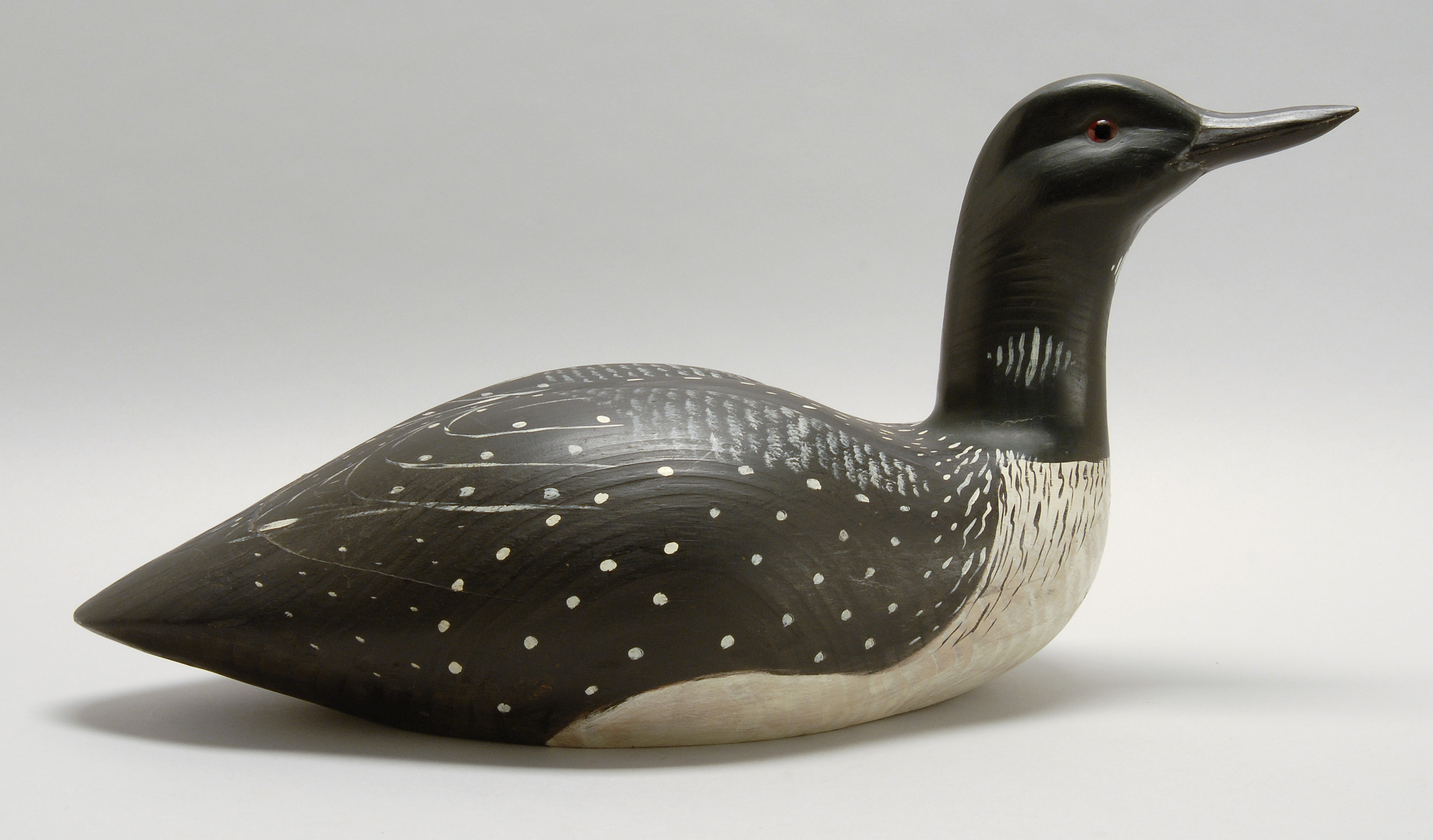 Appraisal: CARVING OF A LOON Circa sBy the Braddock Brothers Glass