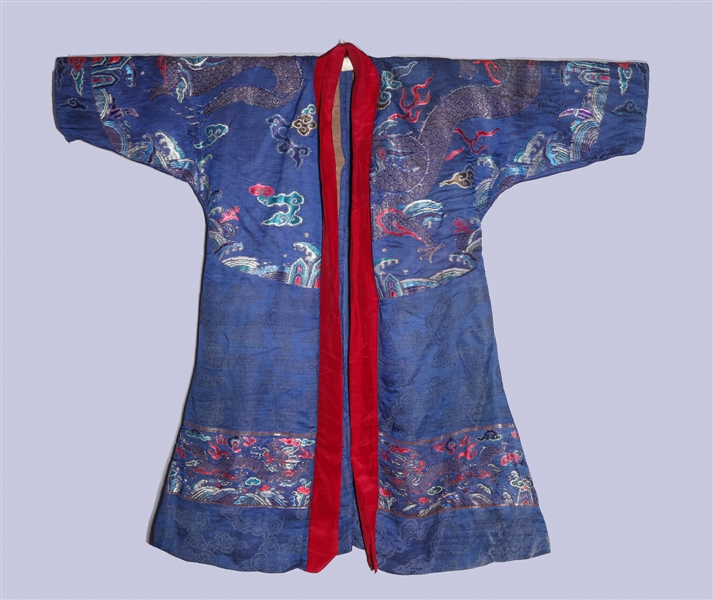 Appraisal: Chinese blue embroidered silk robe with allover designs sleeves and