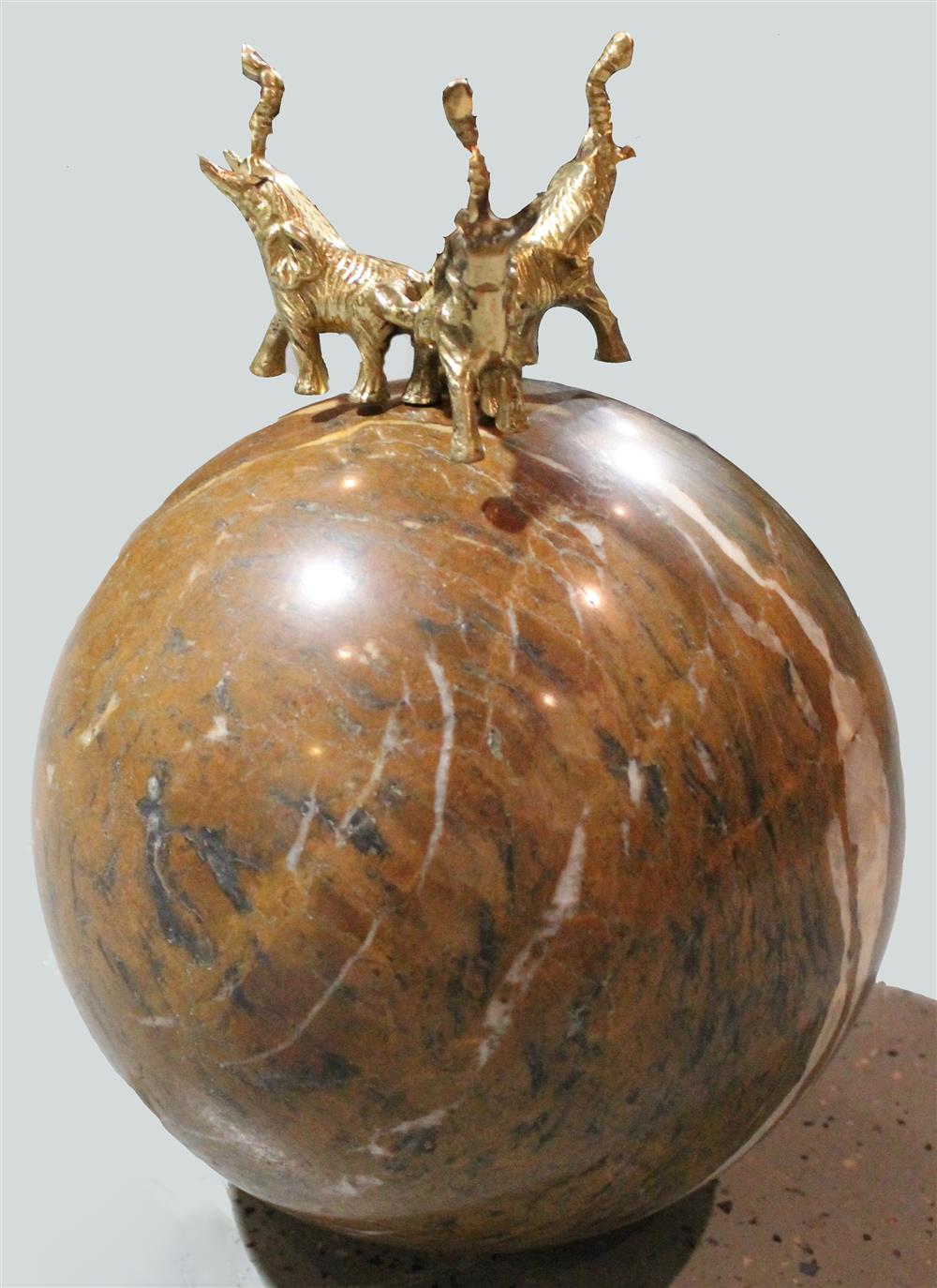 Appraisal: TRAVERTINE SPHERE AND ELEPHANT STAND sphere - dia in